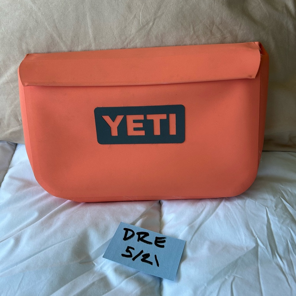 YETI sidekick in coral color dry bag waterproof